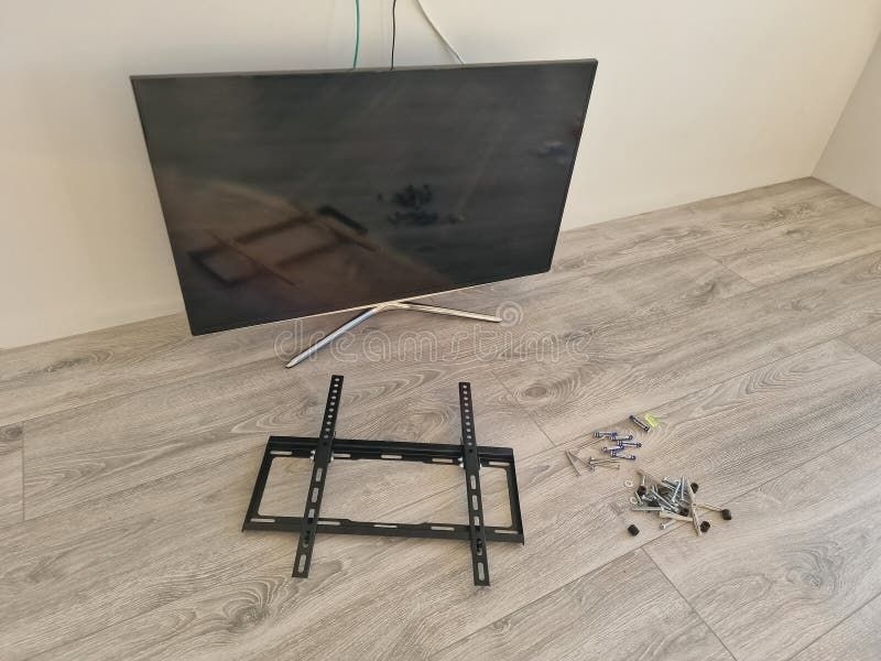 TV Mounting being carried out by a Seb Home Services technician