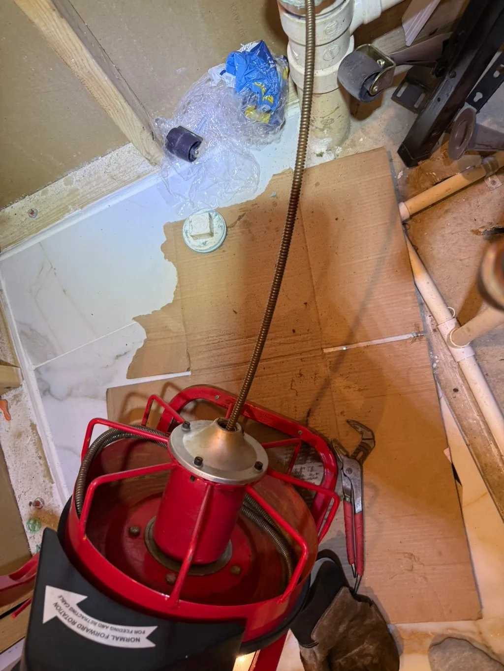 Drain Cleaning being carried out by a Seb Home Services technician
